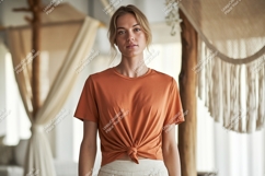 Woman wearing orange t shirt tied at waist image Product Image 1