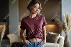 Woman wearing maroon t shirt and blue jeans image Product Image 1