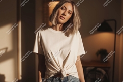 Woman wearing cream t shirt tied at waist image Product Image 1