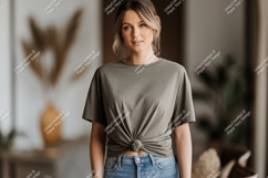 Woman wearing olive green t shirt and denim jeans image Product Image 1
