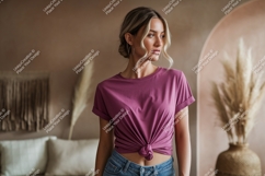 Woman wearing plum t shirt and denim jeans image Product Image 1