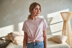 Woman wearing pink t shirt and jeans image Product Image 1