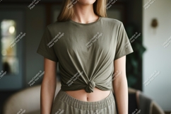Woman wearing olive green t shirt tied at waist image Product Image 1