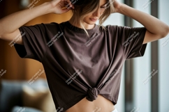 Woman wearing knotted brown t shirt t-shirt fashion Product Image 1