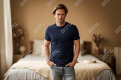 Man wearing dark blue t shirt and denim jeans image Product Image 1