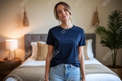 Woman wearing navy blue t shirt and denim shorts image Product Image 1