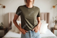 Woman wearing olive green t shirt and denim s Product Image 1