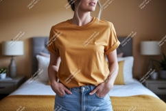 Woman wearing mustard t shirt and denim shorts image Product Image 1