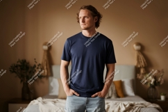Man wearing dark blue t shirt and denim shorts t-shirt Product Image 1