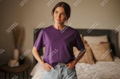 Woman wearing purple t shirt and jeans image Product Image 1