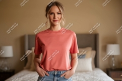 Woman wearing coral t shirt and denim jeans image Product Image 1