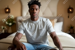 Man wearing grey t-shirt and denim shorts Product Image 1