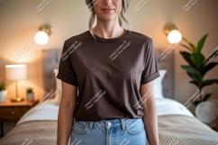 Woman wearing brown t shirt and blue jeans image Product Image 1
