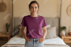 Woman wearing plum t shirt and denim shorts image Product Image 1