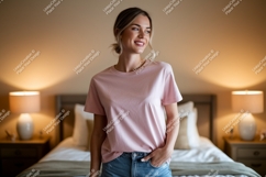 Woman wearing pink t shirt and jeans image Product Image 1