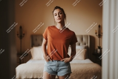 Woman wearing terracotta t shirt denim shorts image Product Image 1