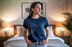 Woman wearing dark blue t shirt and jeans image Product Image 1
