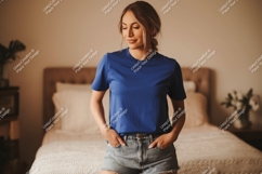 Woman wearing blue t shirt and denim shorts image Product Image 1