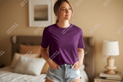 Woman wearing purple t shirt and denim shorts image Product Image 1
