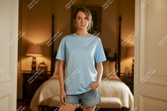 Woman wearing light blue t shirt and denim shorts t-shirt Product Image 1