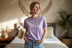 Woman wearing lavender t shirt and denim image Product Image 1
