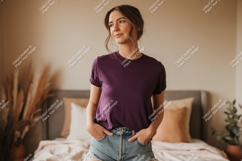 Woman wearing plum t shirt and denim shorts image Product Image 1