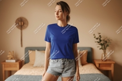 Woman wearing blue t shirt and denim shorts image Product Image 1
