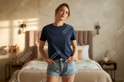 Woman wearing navy t shirt and denim shorts image Product Image 1