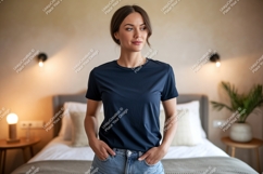 Woman wearing dark blue t-shirt and denim sho Product Image 1