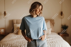 Woman wearing blue t-shirt and denim shorts image Product Image 1