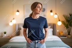 Woman wearing navy t-shirt and denim shorts Product Image 1