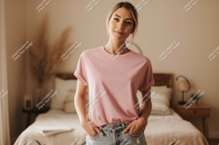 Woman wearing pink t shirt and denim jeans image Product Image 1