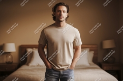 Man wearing casual clothing in bedroom male t-shirt Product Image 1