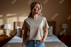 Blonde woman wearing a tan t-shirt and jeans Product Image 1