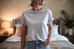 Woman wearing grey t shirt and denim image Product Image 1