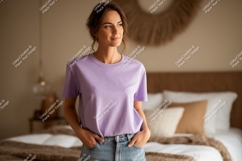 Woman wearing lavender t shirt and denim jeans image Product Image 1