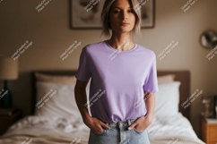 Woman wearing lavender t shirt and denim image Product Image 1