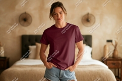 Woman wearing maroon t shirt and denim shorts image Product Image 1
