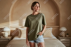 Woman wearing olive green t-shirt and denim shorts Product Image 1