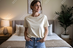 Woman wearing cream t shirt and denim shorts image Product Image 1