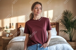 Woman wearing maroon t shirt and denim image Product Image 1