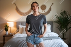 Woman wearing charcoal t shirt and denim shorts t-shirt Product Image 1