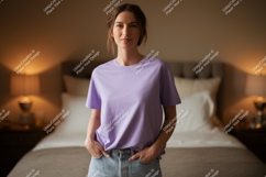 Woman wearing lavender t shirt and denim jeans image Product Image 1