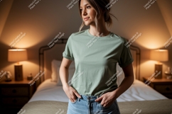 Woman wearing green t shirt and denim image Product Image 1