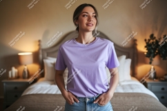 Woman wearing lavender t shirt and denim image Product Image 1