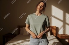 Woman wearing green t shirt and denim shorts image Product Image 1