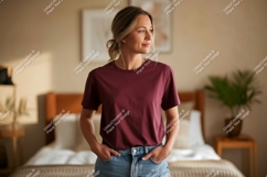 Woman wearing maroon t shirt and denim shorts image Product Image 1