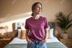 Woman wearing plum t shirt and denim shorts image Product Image 1