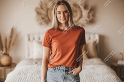 Woman wearing terracotta t shirt and denim shorts image Product Image 1