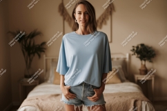 Woman wearing light blue t shirt and denim shorts image Product Image 1